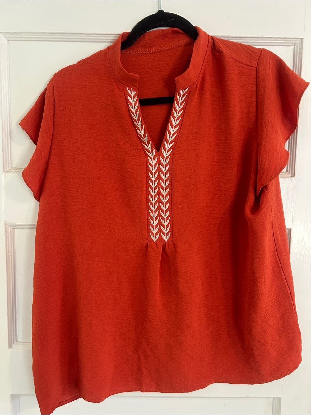 Woven V-Neck Flutter Sleeve Top in Rust Orange
